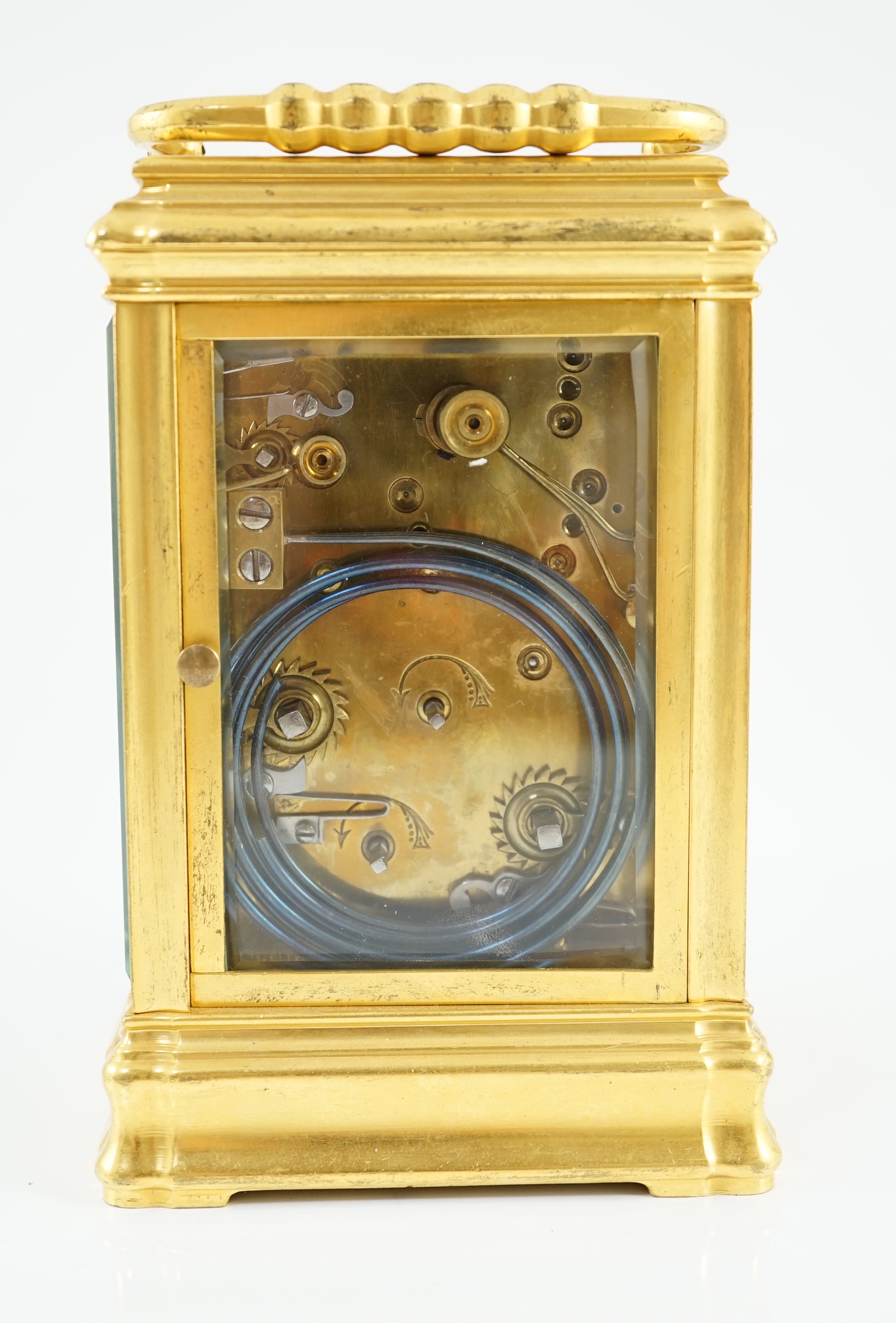 An early 20th century French ormolu Grande Sonnerie alarum clock, with enamelled Arabic dials and gorge case, movement striking on two blued steel gongs, 10cm wide, 9cm deep, 15.5cm high